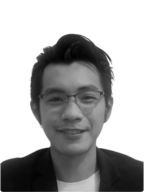 Raneille, team member at Bidbuddy, smiling in a black and white portrait.