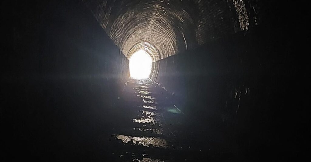 Tunnel with a bright light at th end signifying this blog is the answer